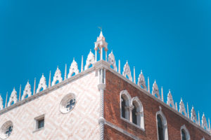 Piazza San Marco Saint Mark Square with Basilica di San Marco. Roof architecture details against blue sky in Venice,Italy. Tourist attraction, summer city trip. Piazza San Marco Saint Mark Square with Basilica di San Marco. Roof architecture details against blue sky in Venice,Italy. Tourist attraction, summer city trip.